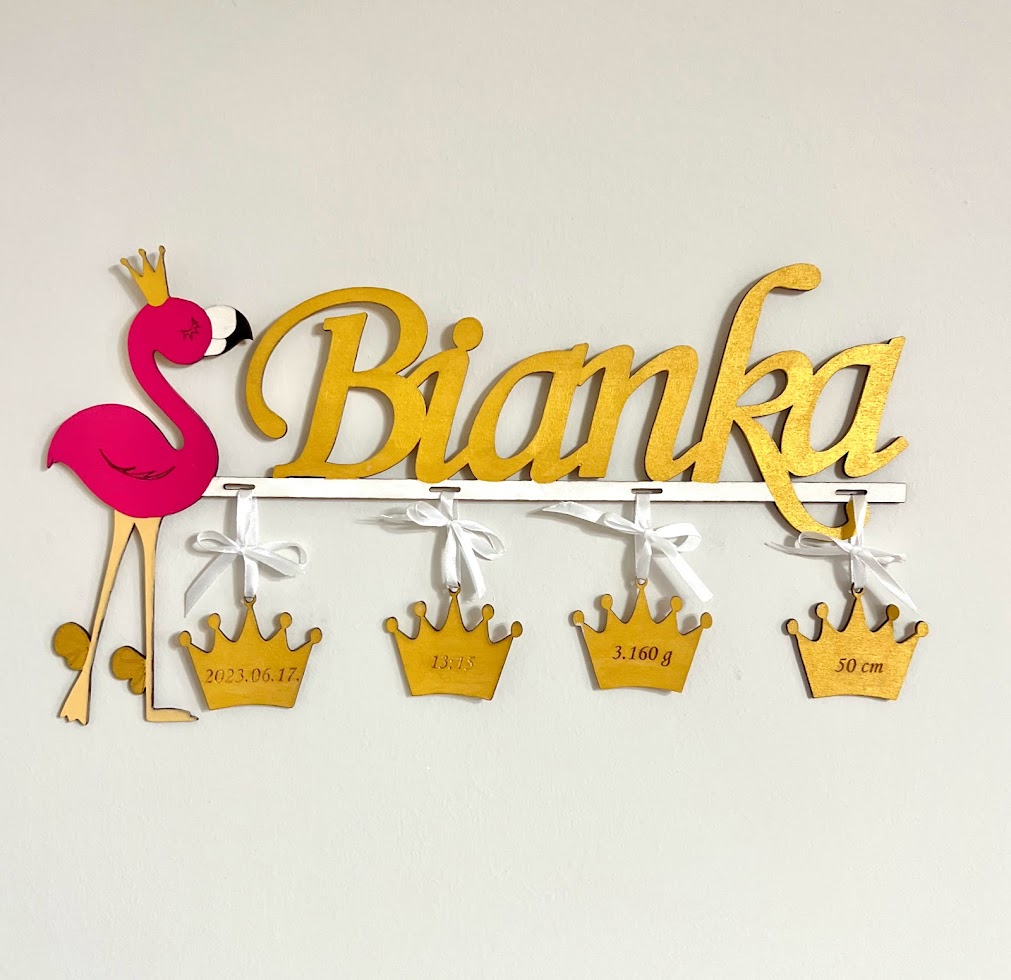 Flamingó névtábla a baba születési adataival